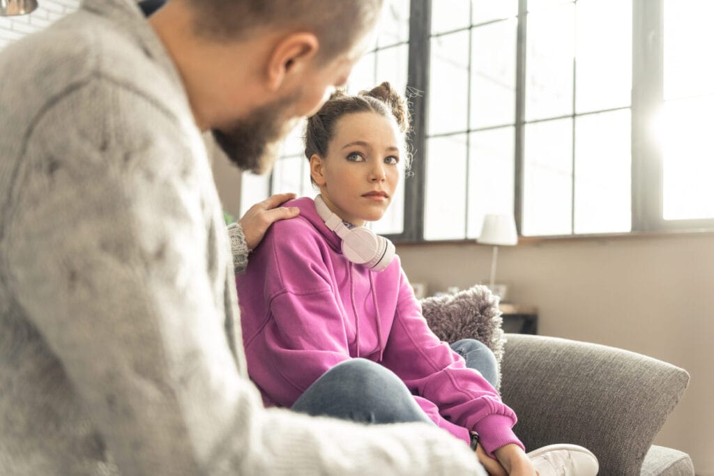 Foster parent speaking to teenager